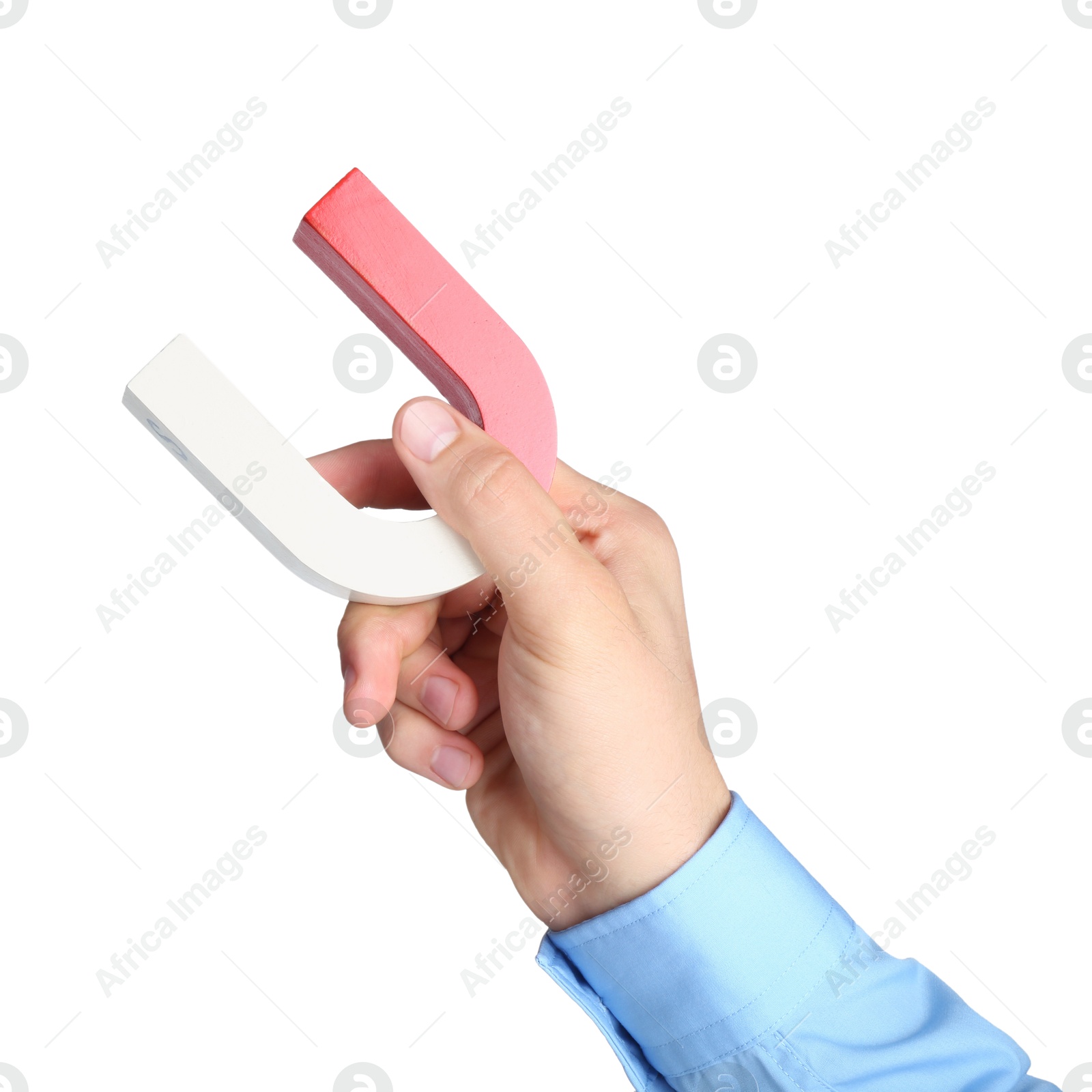 Photo of Man with horseshoe magnet on white background, closeup