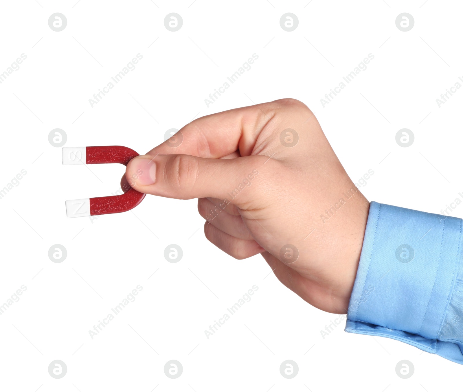 Photo of Man with horseshoe magnet on white background, closeup