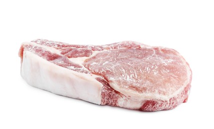 Photo of One frozen pork steak isolated on white