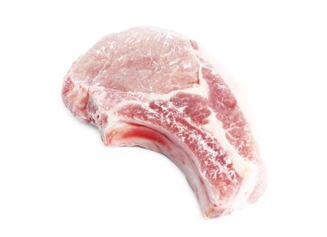 Photo of One frozen pork steak isolated on white