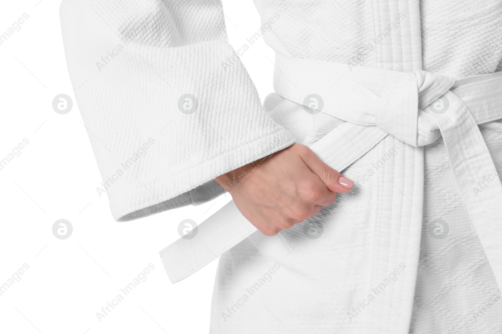 Photo of Karate fighter in kimono isolated on white, closeup