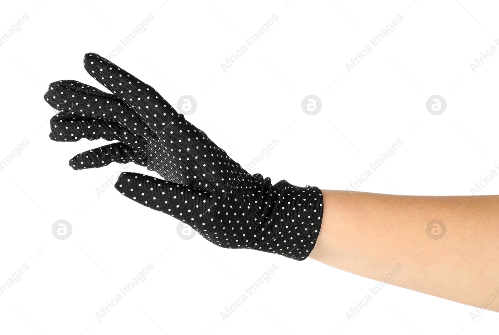 Photo of Woman in elegant polka dot glove isolated on white, closeup