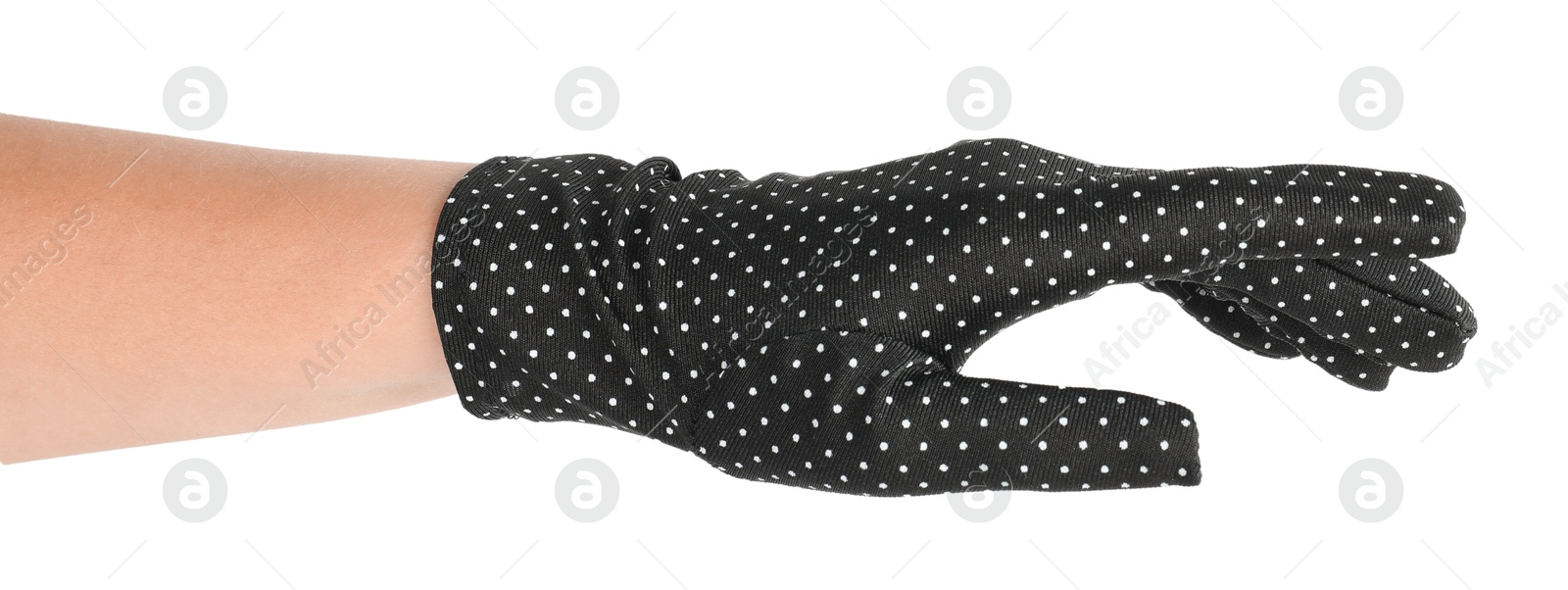 Photo of Woman in elegant polka dot glove isolated on white, closeup