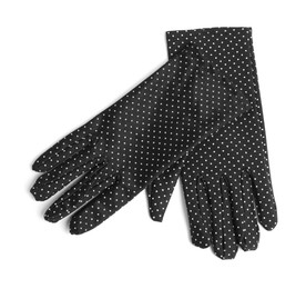 Photo of Elegant polka dot gloves isolated on white, top view