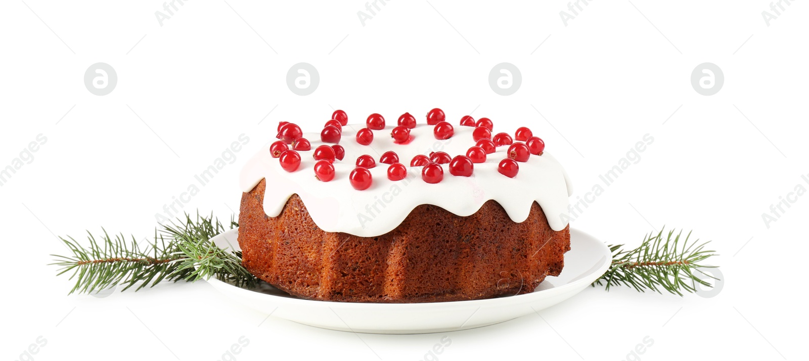 Photo of Tasty Christmas cake with red currants and fir branches isolated on white