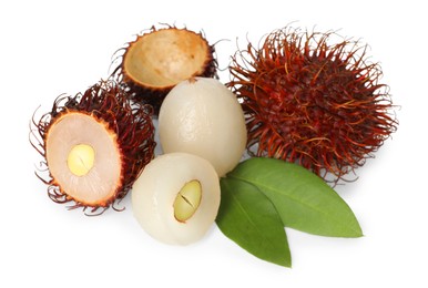 Delicious ripe rambutans and green leaves isolated on white. Exotic fruit