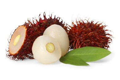 Photo of Delicious ripe rambutans and green leaves isolated on white. Exotic fruit