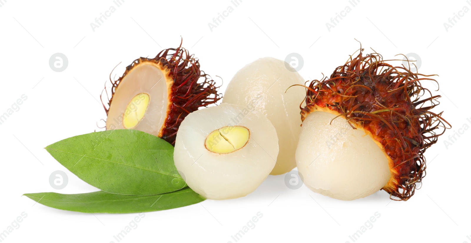 Photo of Delicious ripe rambutans and green leaves isolated on white. Exotic fruit