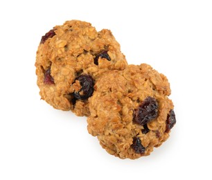 Photo of Delicious oatmeal cookies with dried cranberries and nuts isolated on white, top view