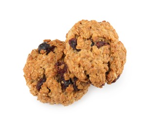 Delicious oatmeal cookies with dried cranberries and nuts isolated on white, top view