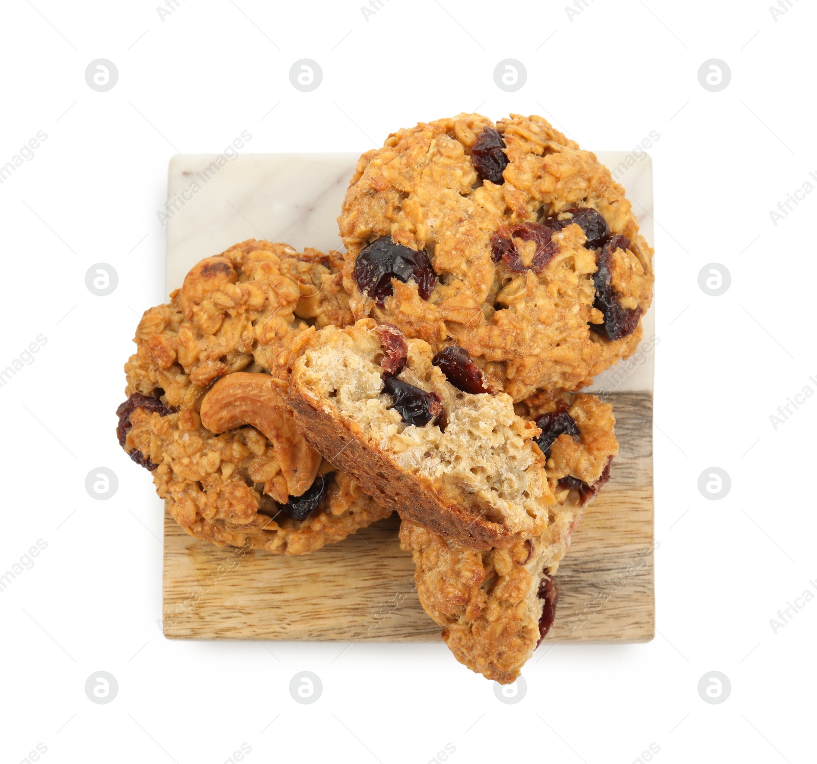 Photo of Delicious oatmeal cookies with dried cranberries and nuts isolated on white, top view