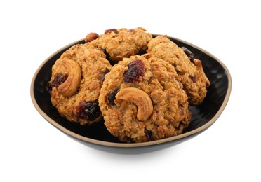 Delicious oatmeal cookies with dried cranberries and nuts in bowl isolated on white