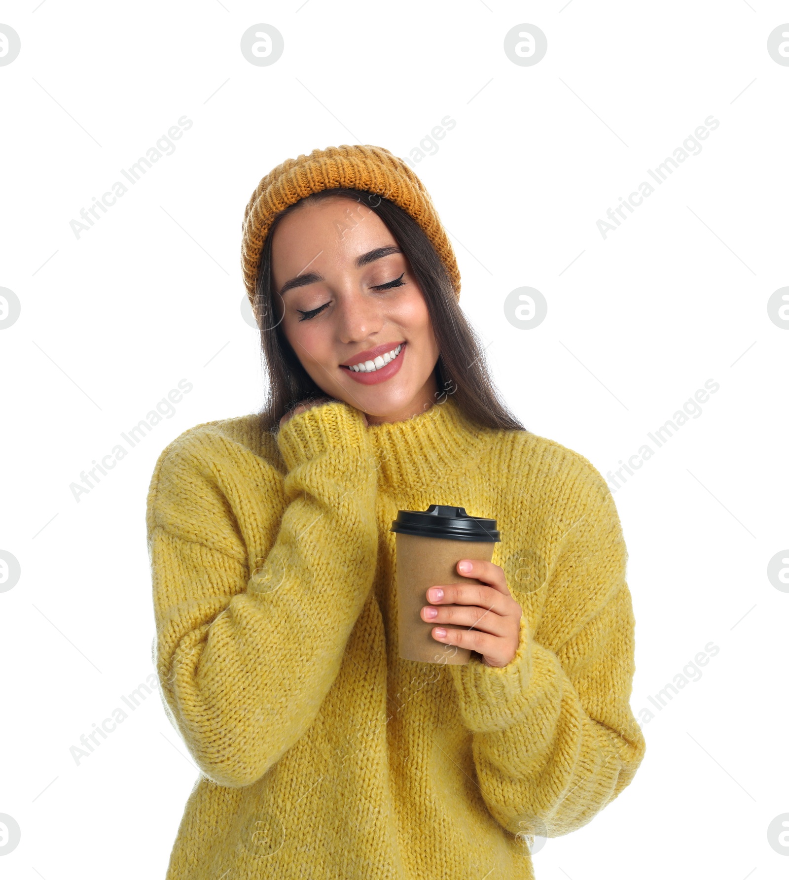 Photo of Happy beautiful woman with paper cup of mulled wine on white background