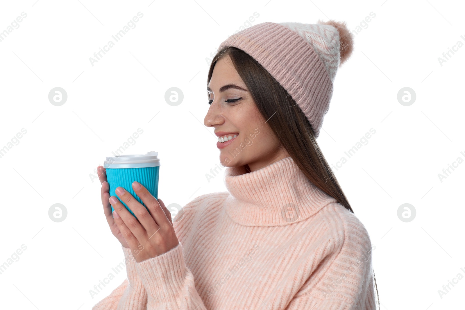 Photo of Happy beautiful woman with paper cup of mulled wine on white background