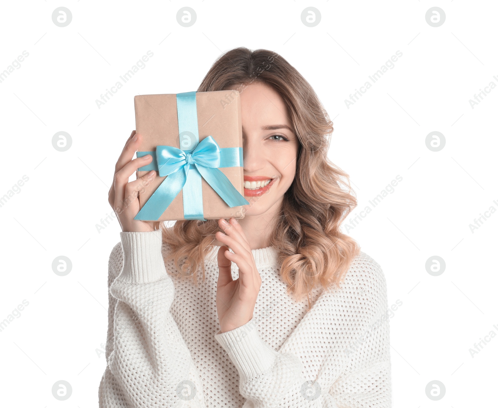 Photo of Beautiful young woman with Christmas present on white background