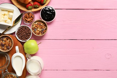 Photo of Different tasty food served for brunch on pink wooden table, flat lay. Space for text