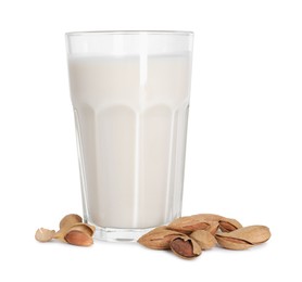 Glass of almond milk and nuts isolated on white