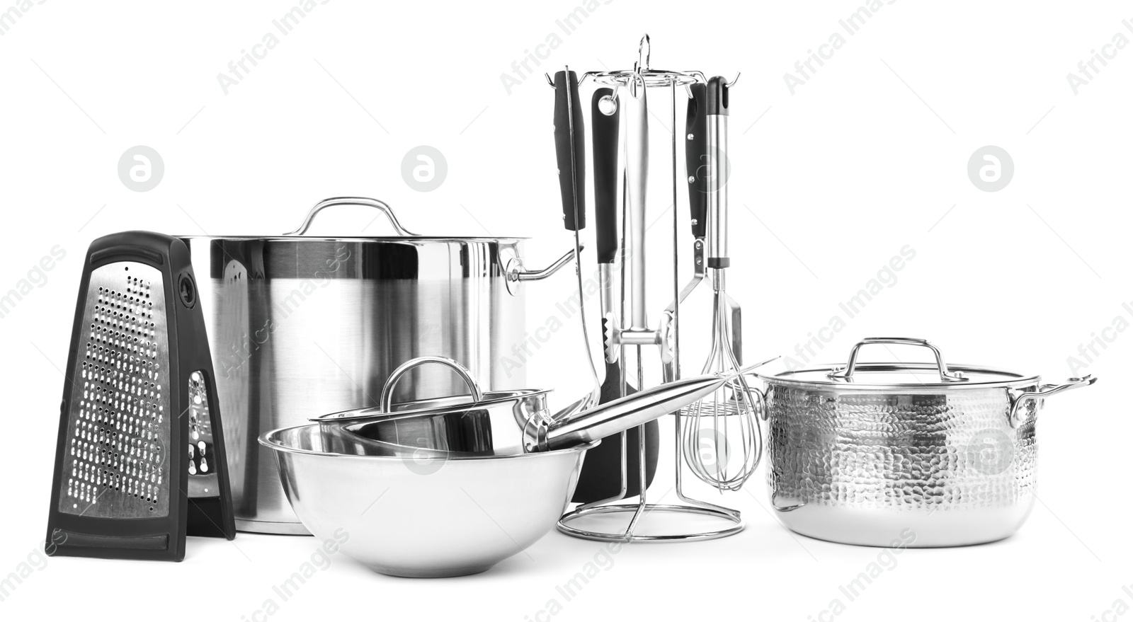 Photo of Set of different cooking utensils isolated on white