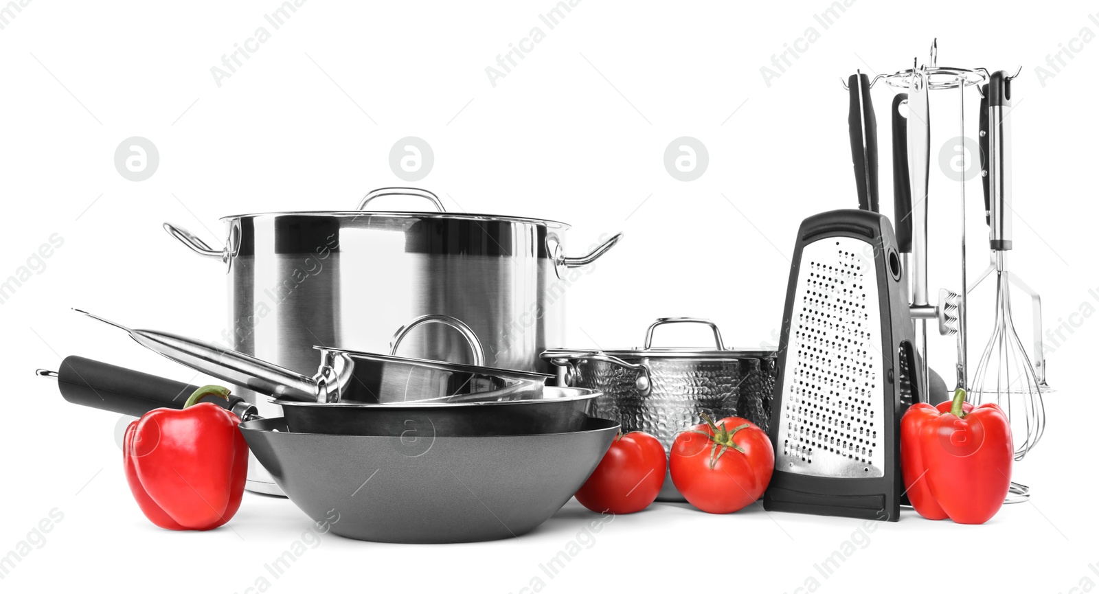 Photo of Different cooking utensils and products isolated on white