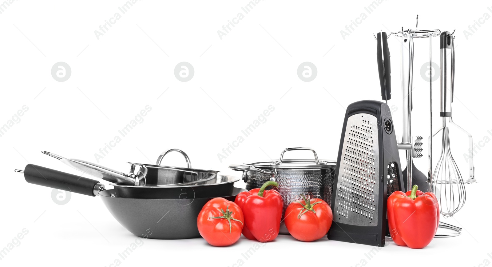 Photo of Different cooking utensils and products isolated on white