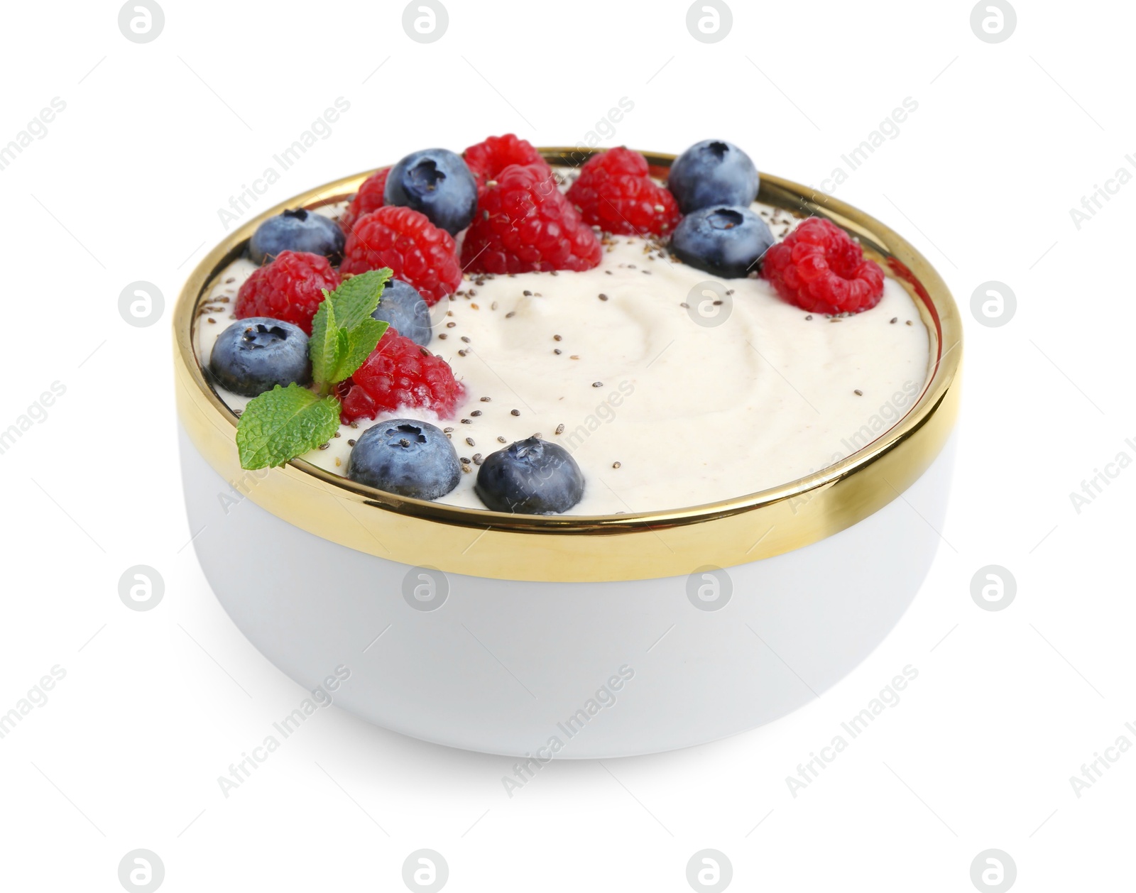 Photo of Tasty cooked semolina porridge with berries and mint isolated on white