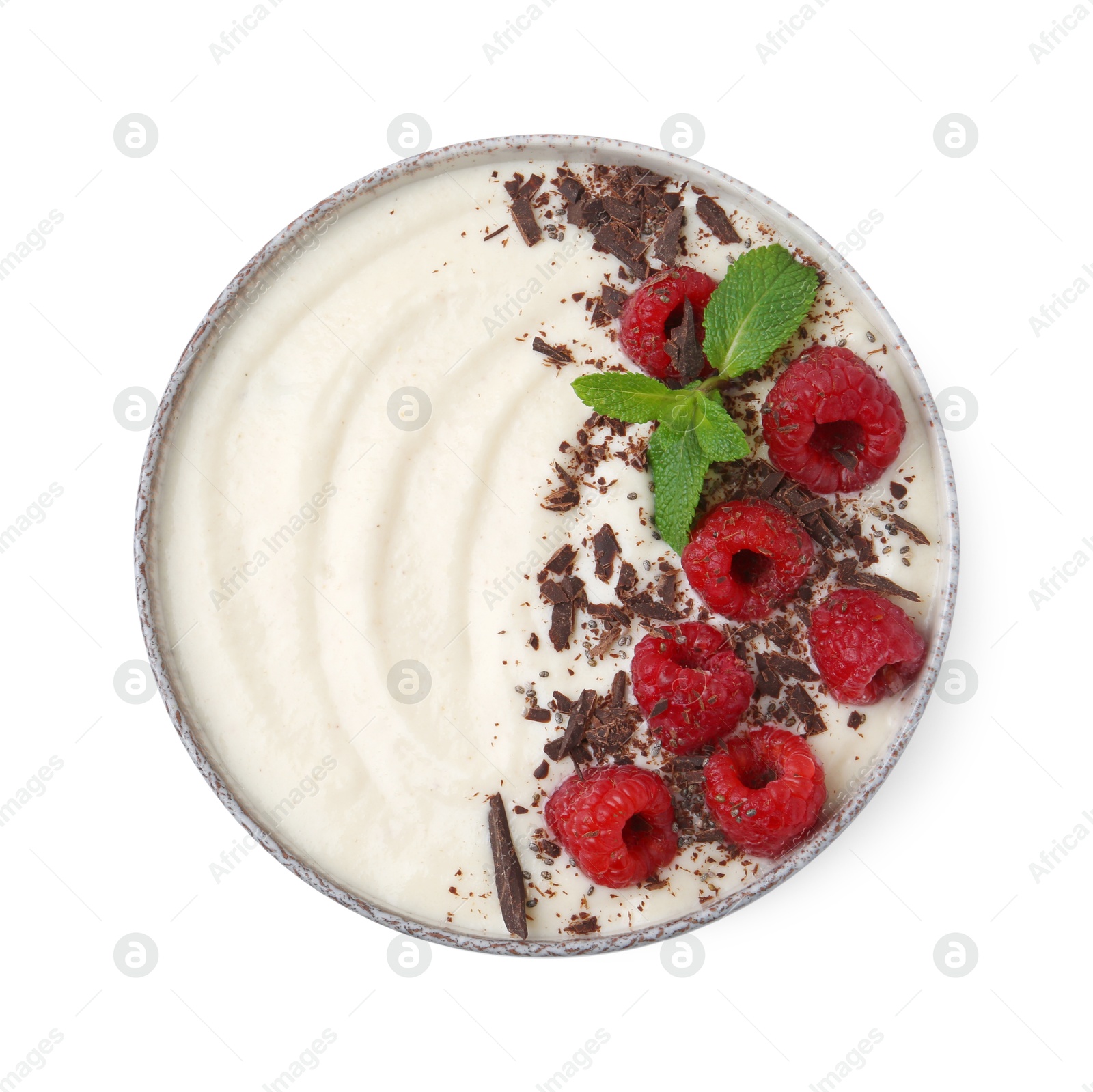 Photo of Tasty cooked semolina porridge with raspberries, chocolate and mint isolated on white, top view