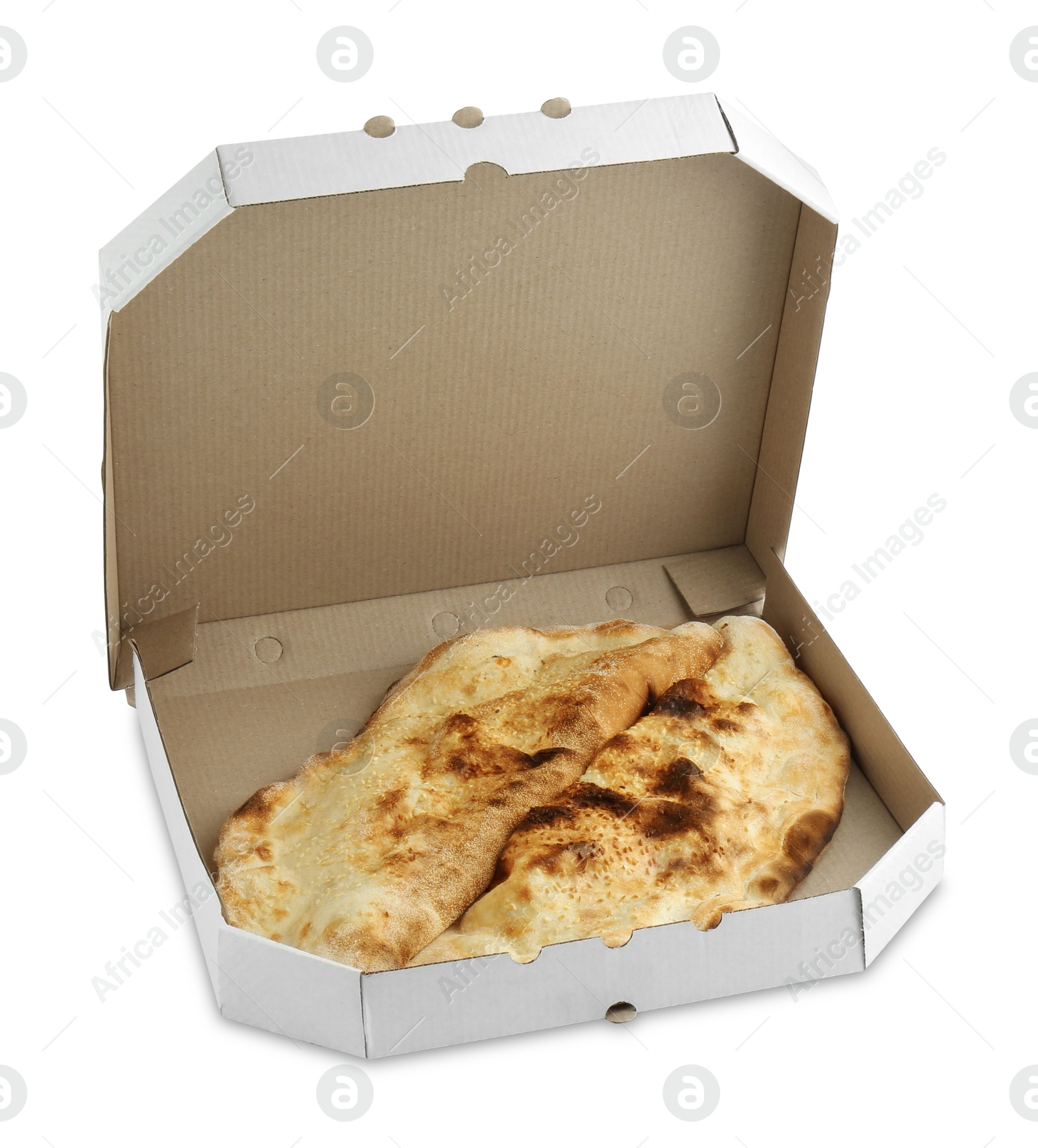 Photo of Delicious calzones in cardboard box isolated on white