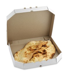 Delicious calzones in cardboard box isolated on white