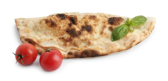 Photo of Delicious calzone with fresh basil and tomatoes isolated on white