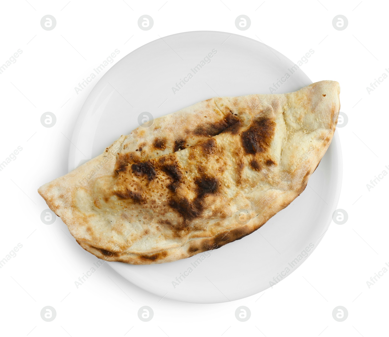 Photo of One delicious calzone isolated on white, top view