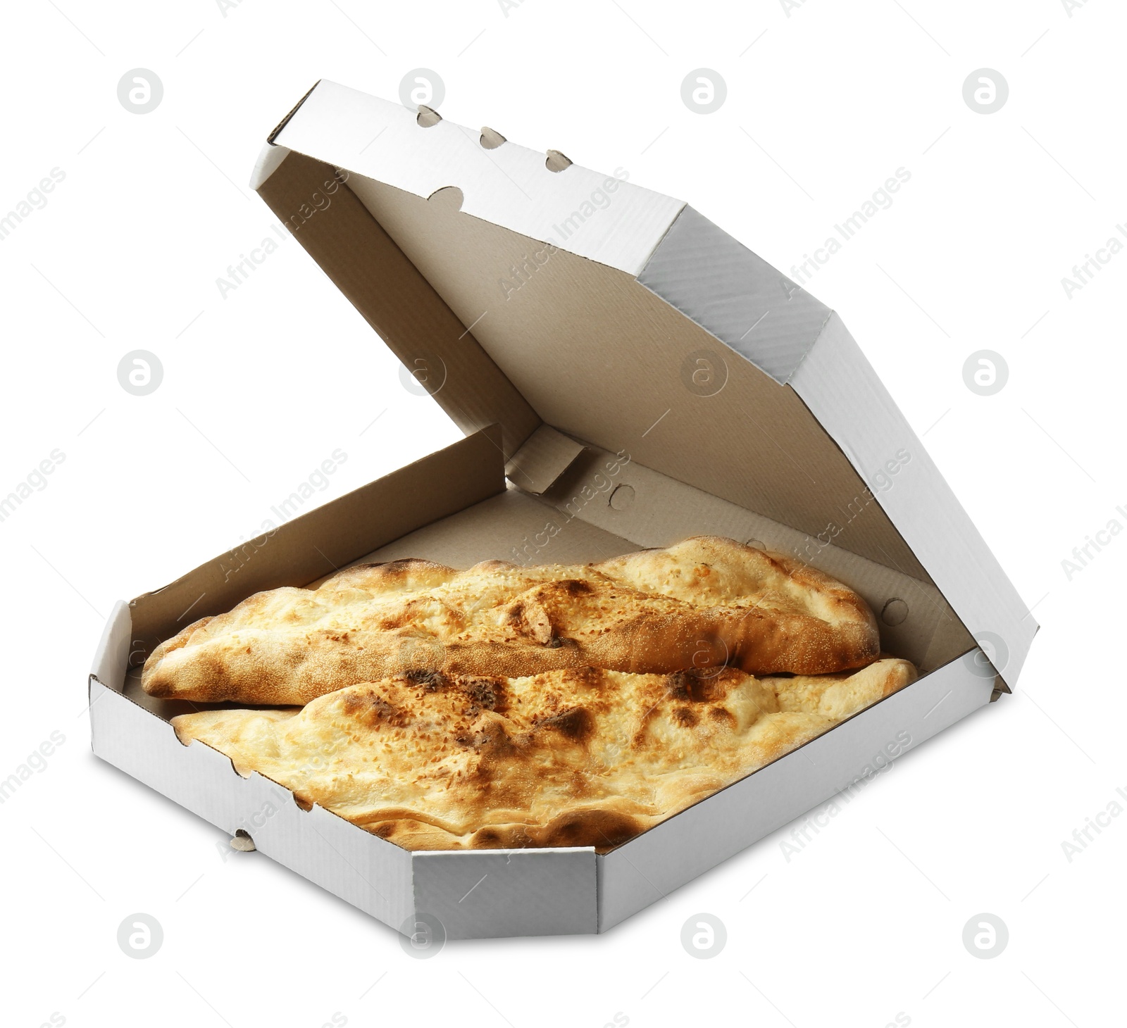 Photo of Delicious calzones in cardboard box isolated on white