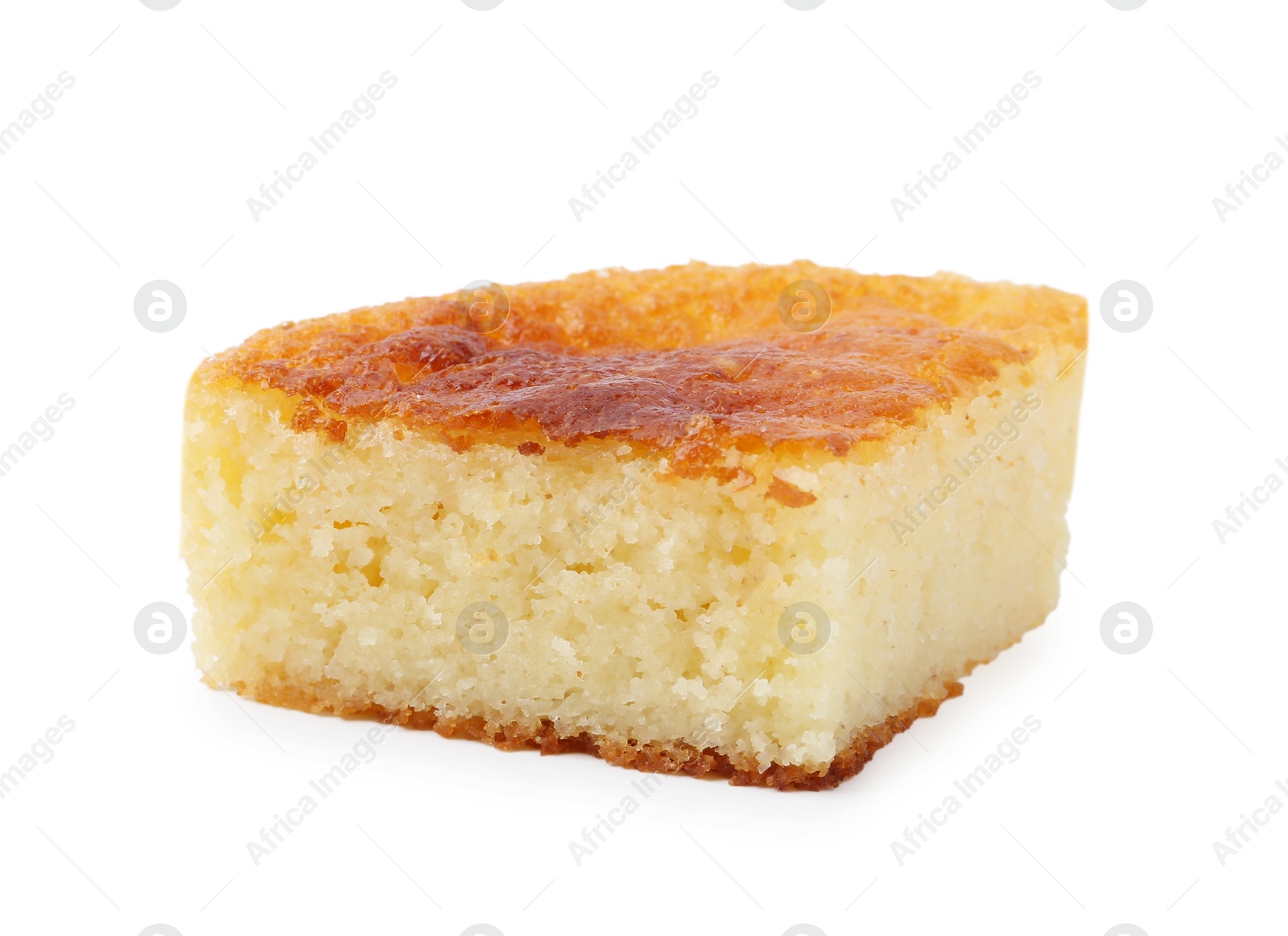 Photo of Slice of tasty homemade semolina cake isolated on white