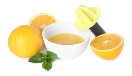 Photo of Plastic juicer, fresh orange juice, fruits and mint isolated on white