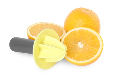 Photo of Plastic juicer and oranges isolated on white