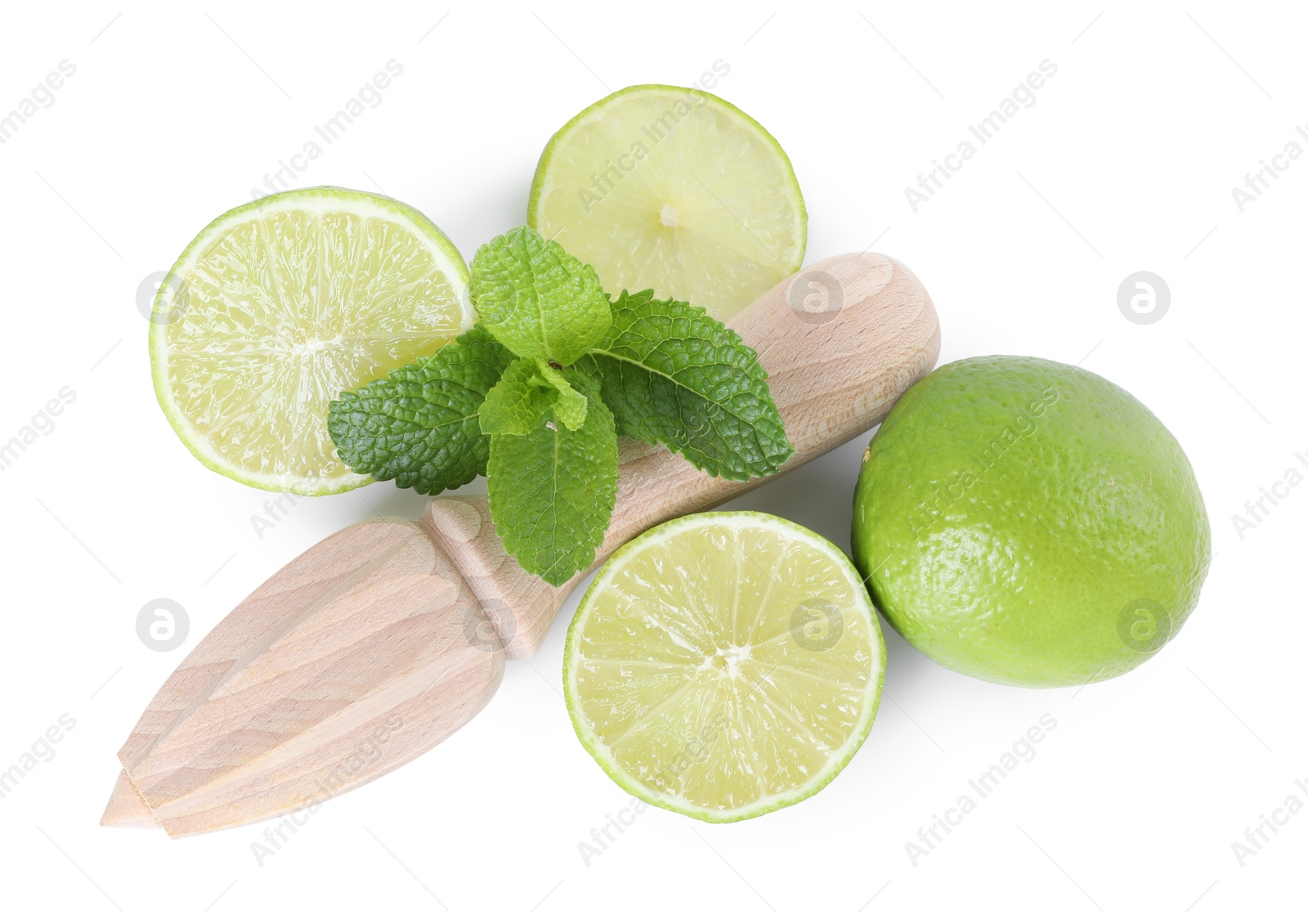 Photo of Wooden juicer, lime and mint isolated on white, top view