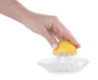 Photo of Woman with lemon using juicer on white background, closeup