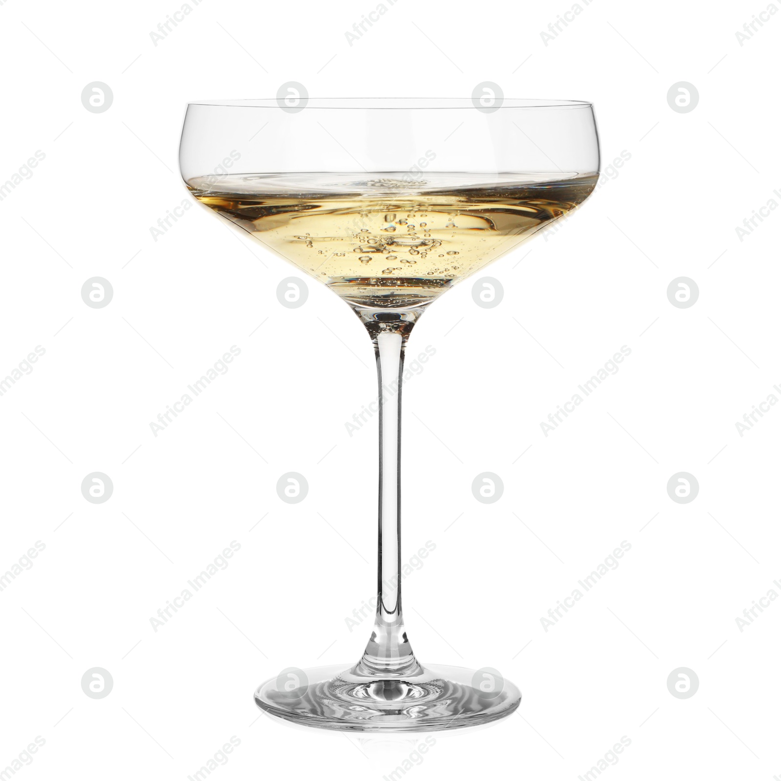 Photo of Pouring champagne into glass isolated on white