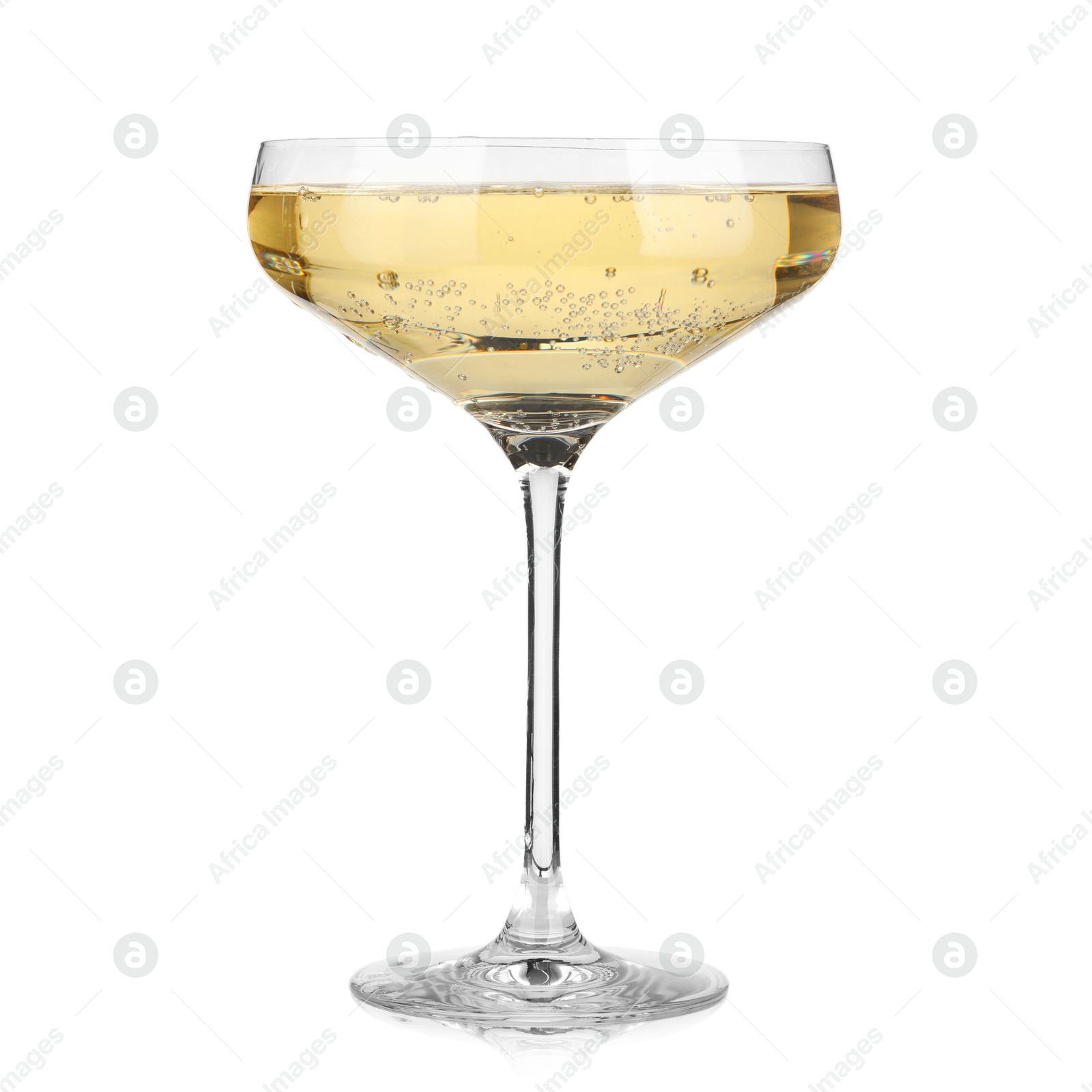 Photo of Champagne in glass isolated on white. Sparkling wine