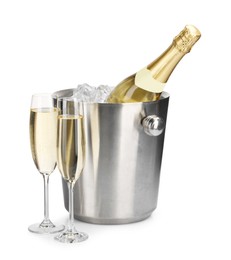 Photo of Champagne and bucket with ice isolated on white