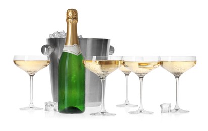 Photo of Champagne and bucket with ice isolated on white