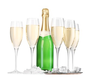 Bottle and glasses of champagne with ice cubes isolated on white