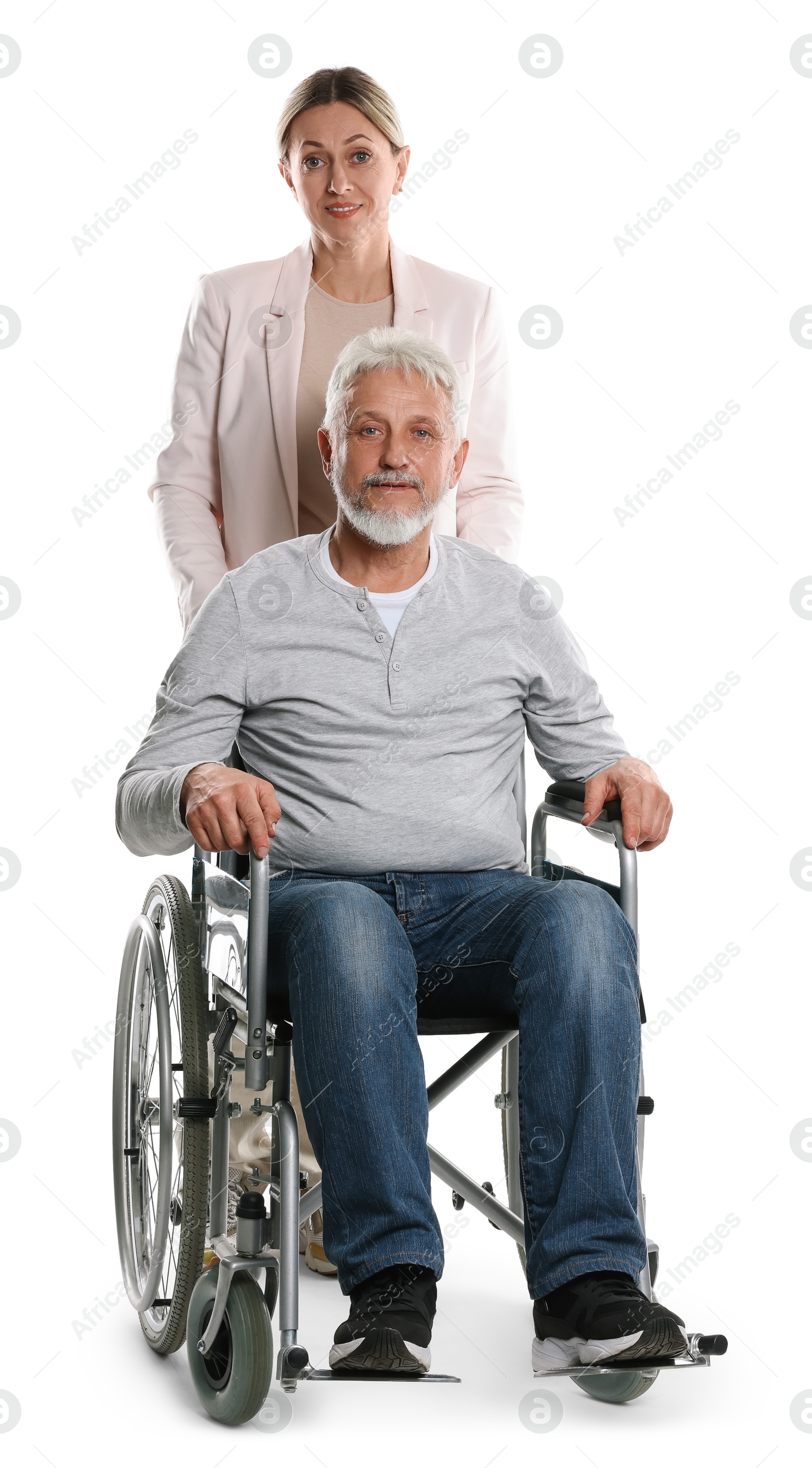 Photo of Woman with senior man in wheelchair on white background