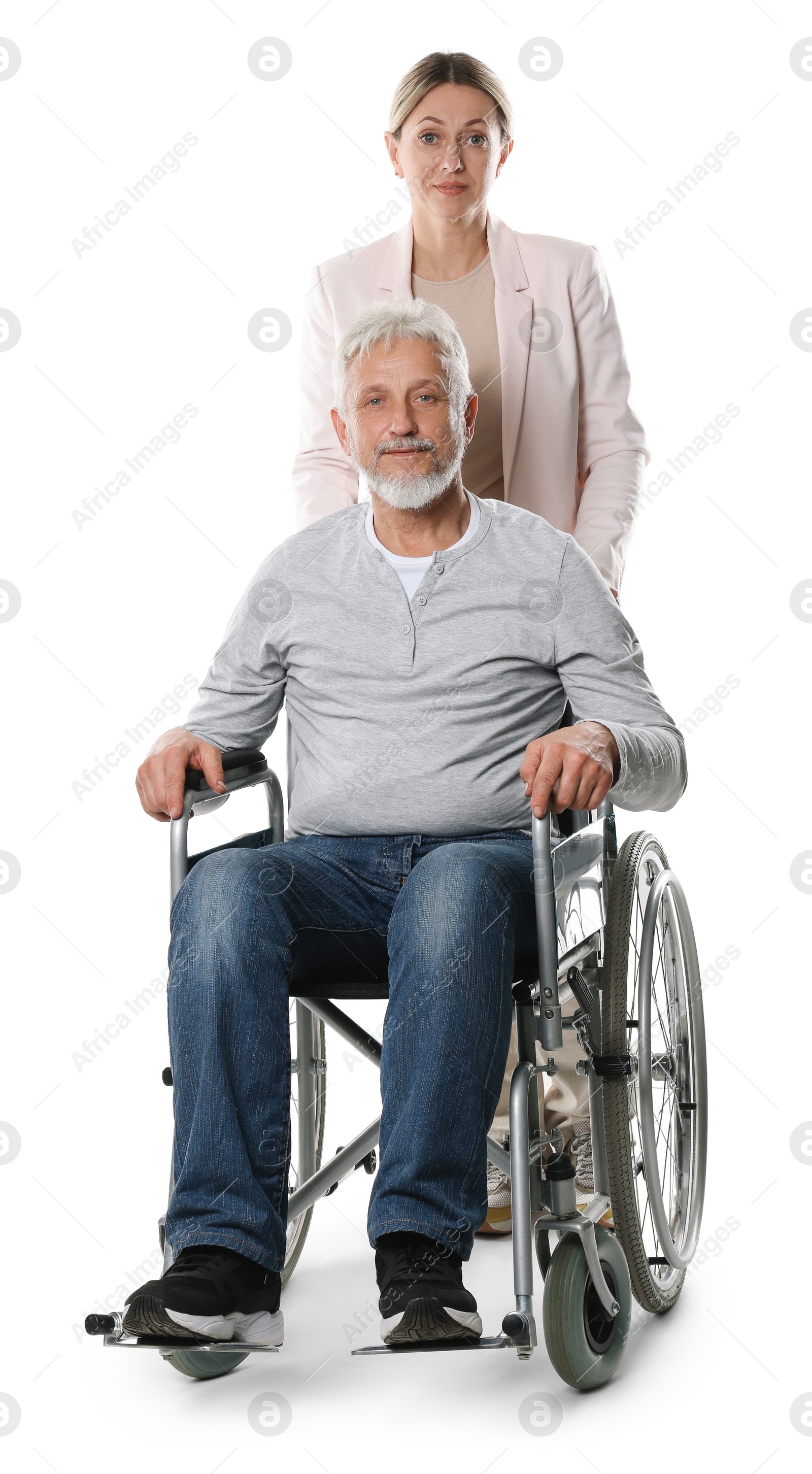 Photo of Woman with senior man in wheelchair on white background