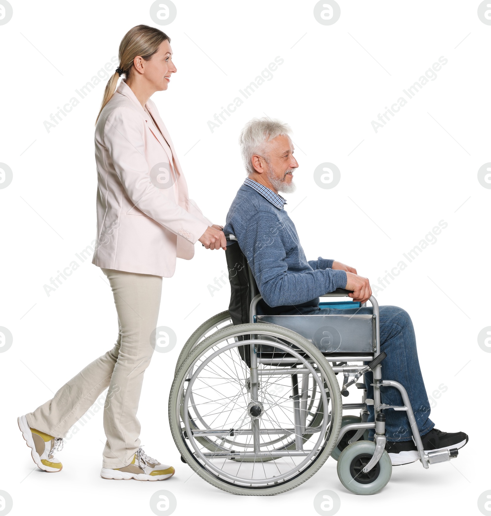 Photo of Woman with senior man in wheelchair on white background