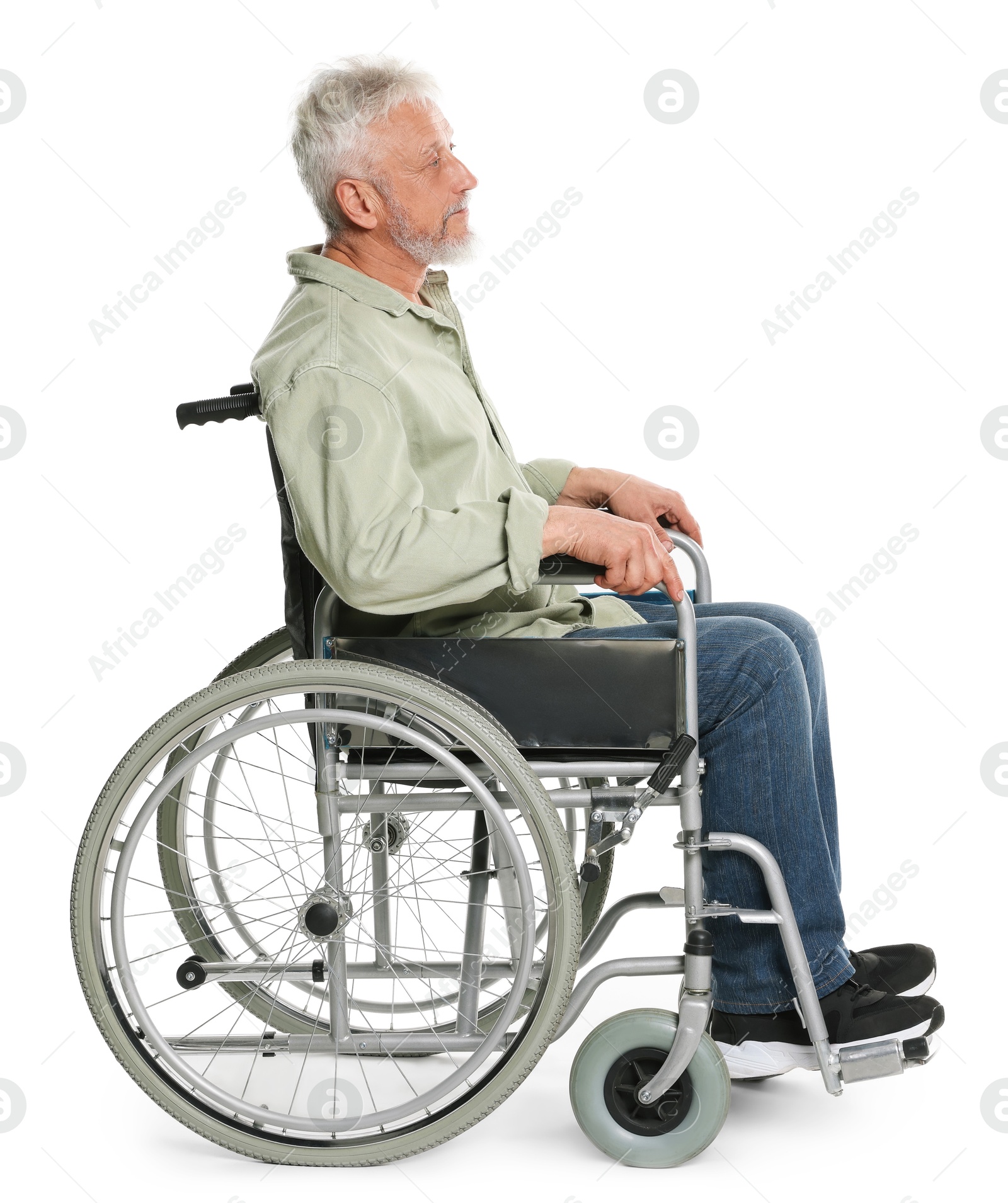 Photo of Senior man in wheelchair on white background