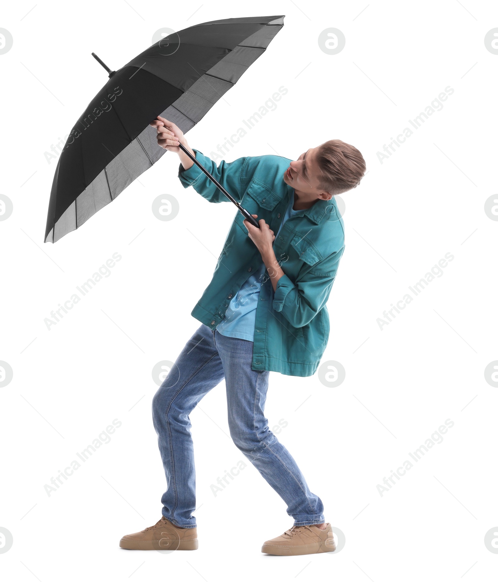 Photo of Man with black umbrella on white background