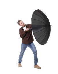 Photo of Man with black umbrella on white background