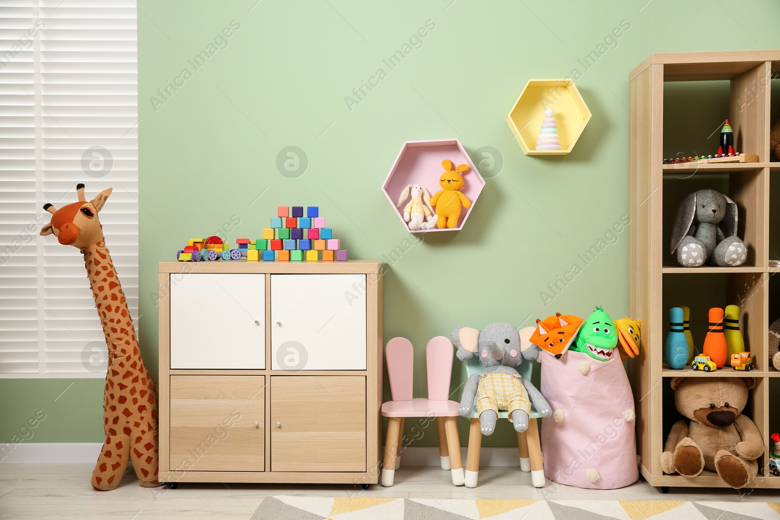 Photo of Child's room interior with many different toys