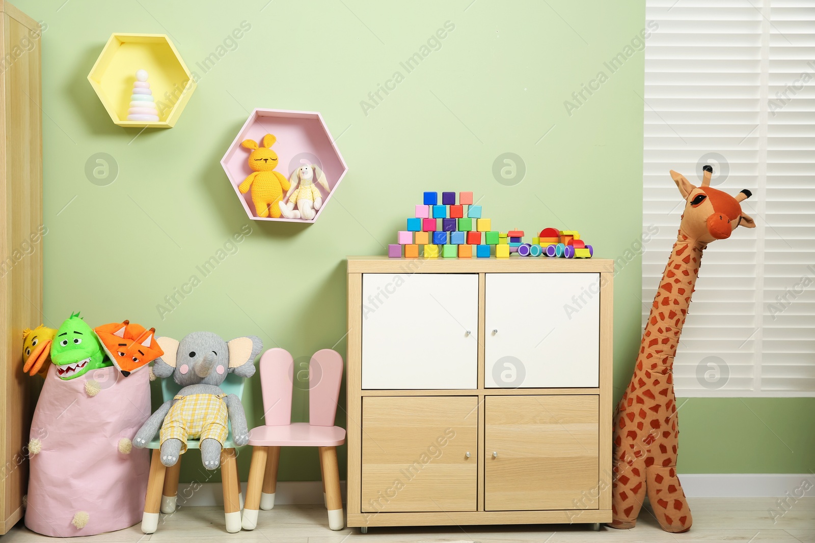 Photo of Child's room interior with many different toys