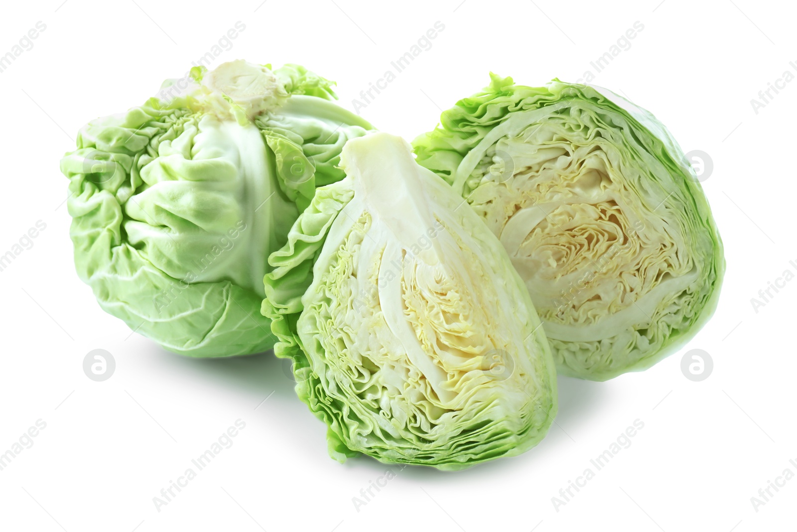 Photo of Whole and cut cabbages isolated on white